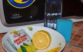 Почистване на микровълновата с лимонена киселина от мазнини: как да се измие бързо за 5 минути